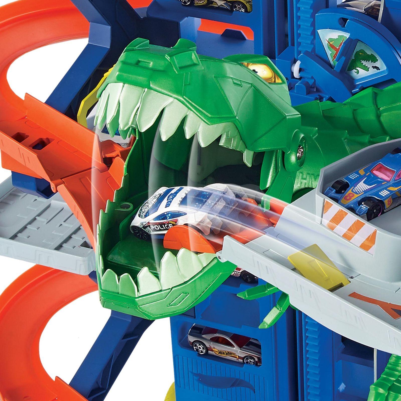Hot Wheels Garaaž, Hot Wheels Parkla koos 2 mänguautoga, mitmekorruseline autorada, T-Rexi rünnak ja ruumi +100 autole, kõrgus: 90 cm, mänguasi alates 5. eluaastast, GJL14 – pakend ja tarvikud