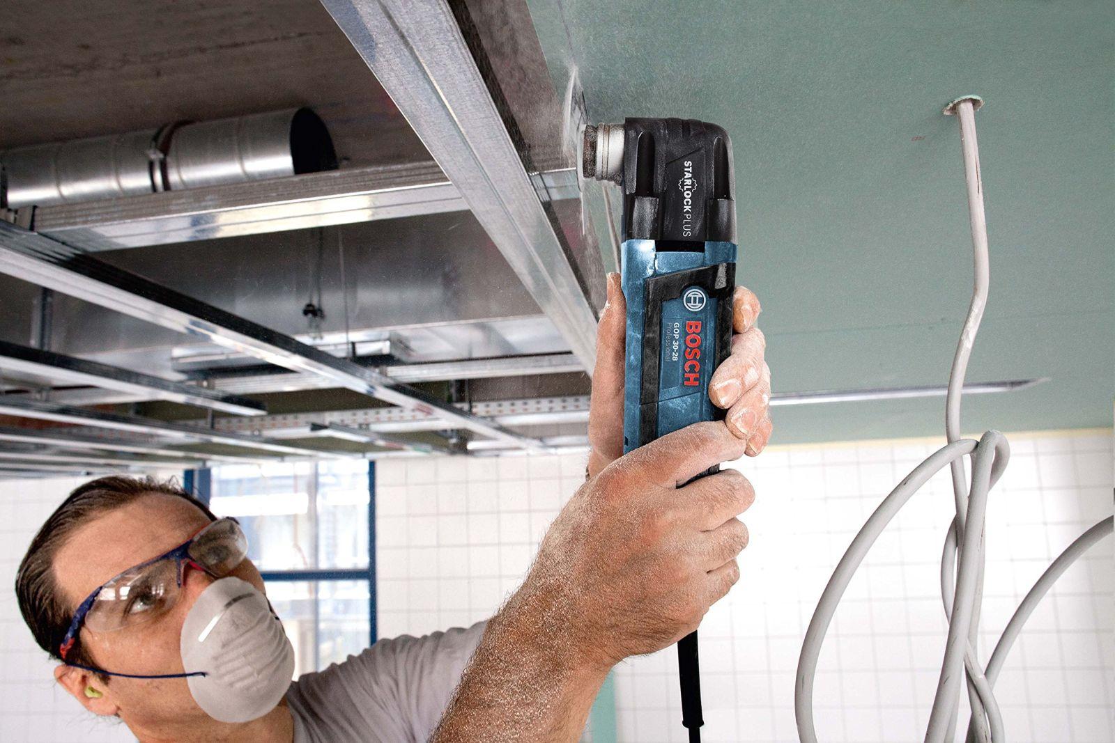 Bosch Professional Multi-Lõikur GOP 30-28 (Starlock-tööriistakinnitus, 300 W, sisaldab 1x StarlockPlus BIM sügavlõiketeraga saelehte) – pakend ja tarvikud