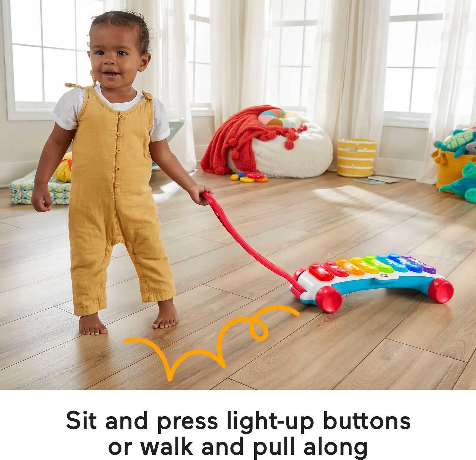 Fisher-Price värvikas muusikaline kitarri‑xülofoni mänguasi – kasutusnäide