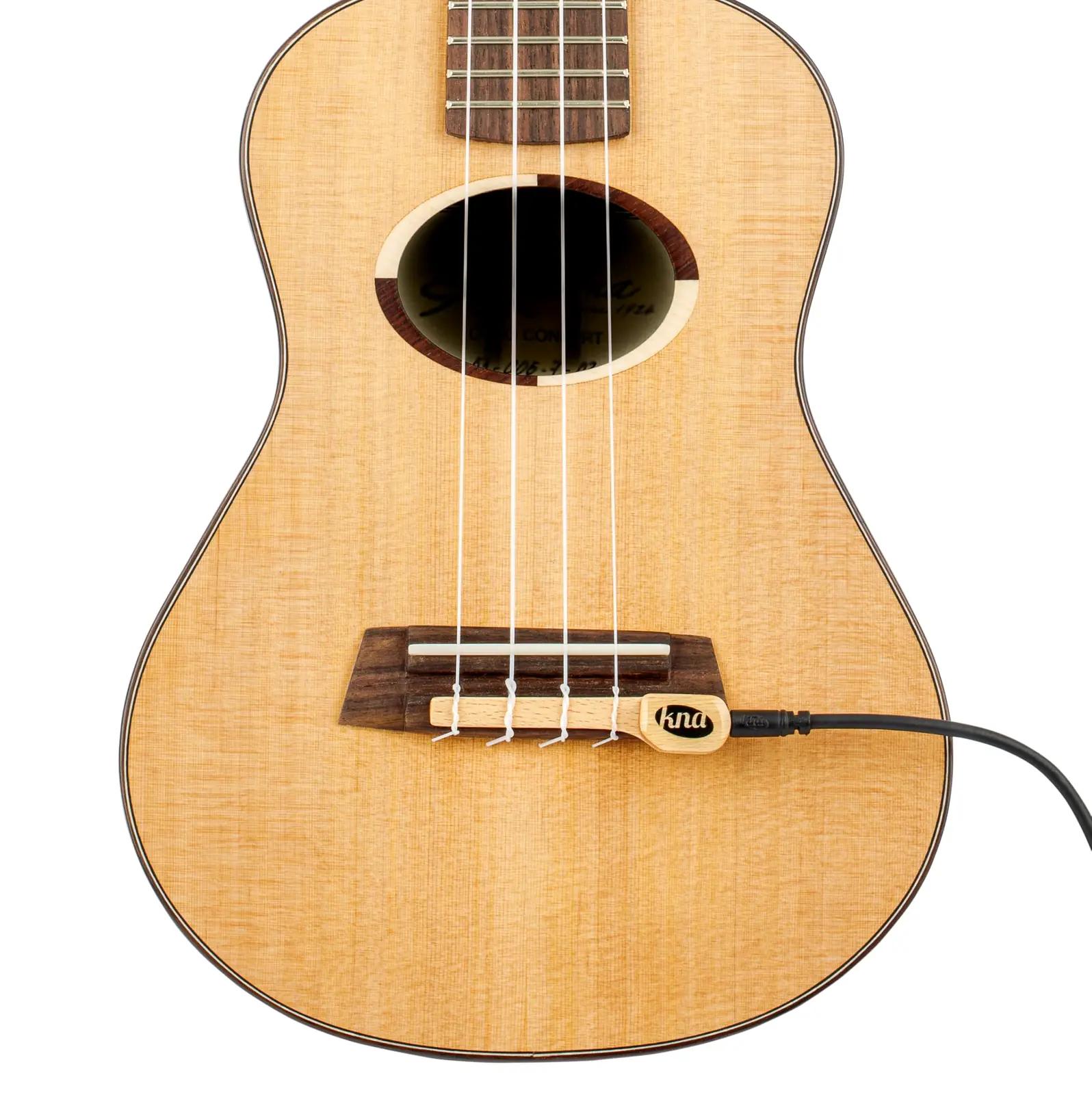 KNA ukulele piezo‑ripats naturaalsest plastikust — täpne heli – pakend ja tarvikud