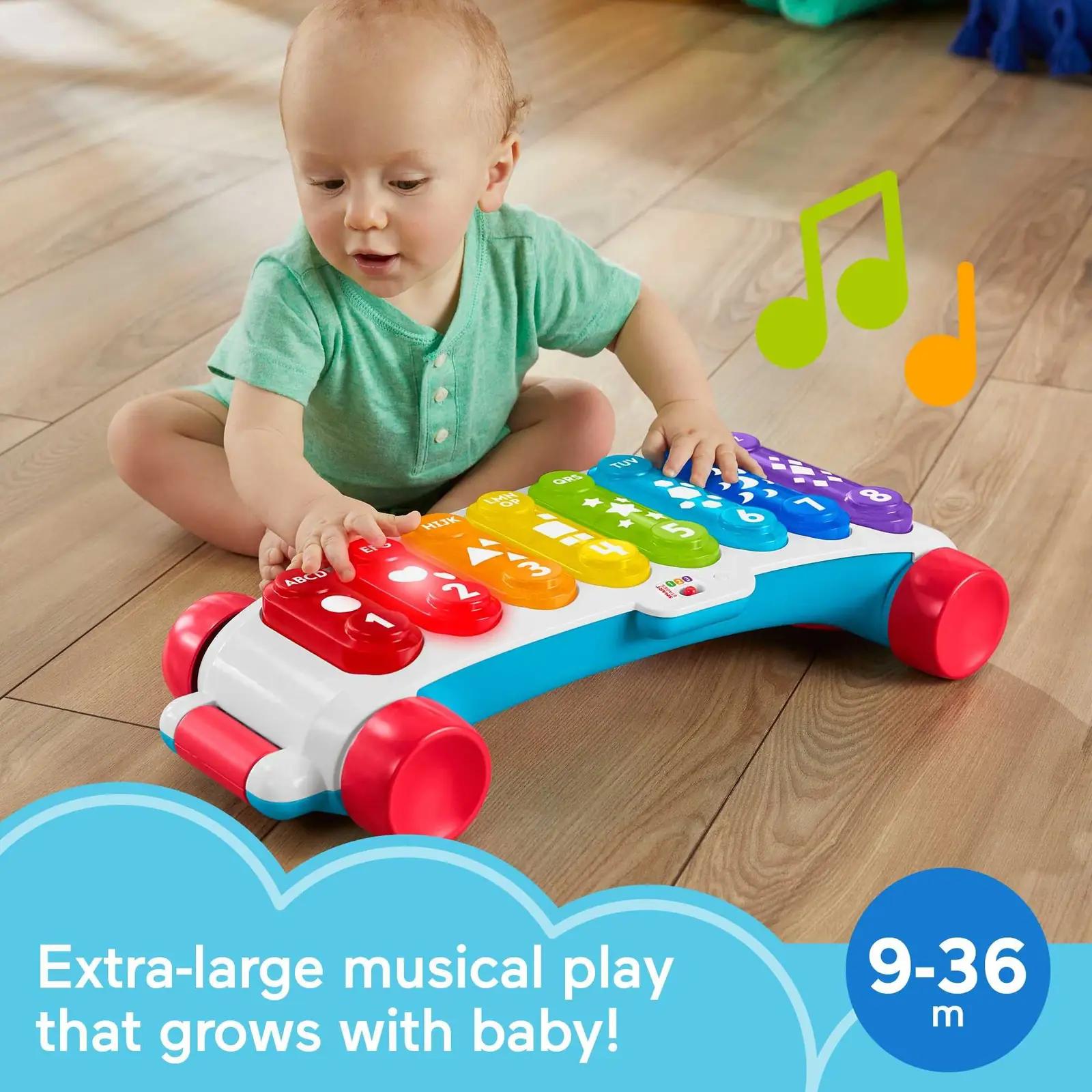 Fisher-Price värvikas muusikaline kitarri‑xülofoni mänguasi – pakend ja tarvikud
