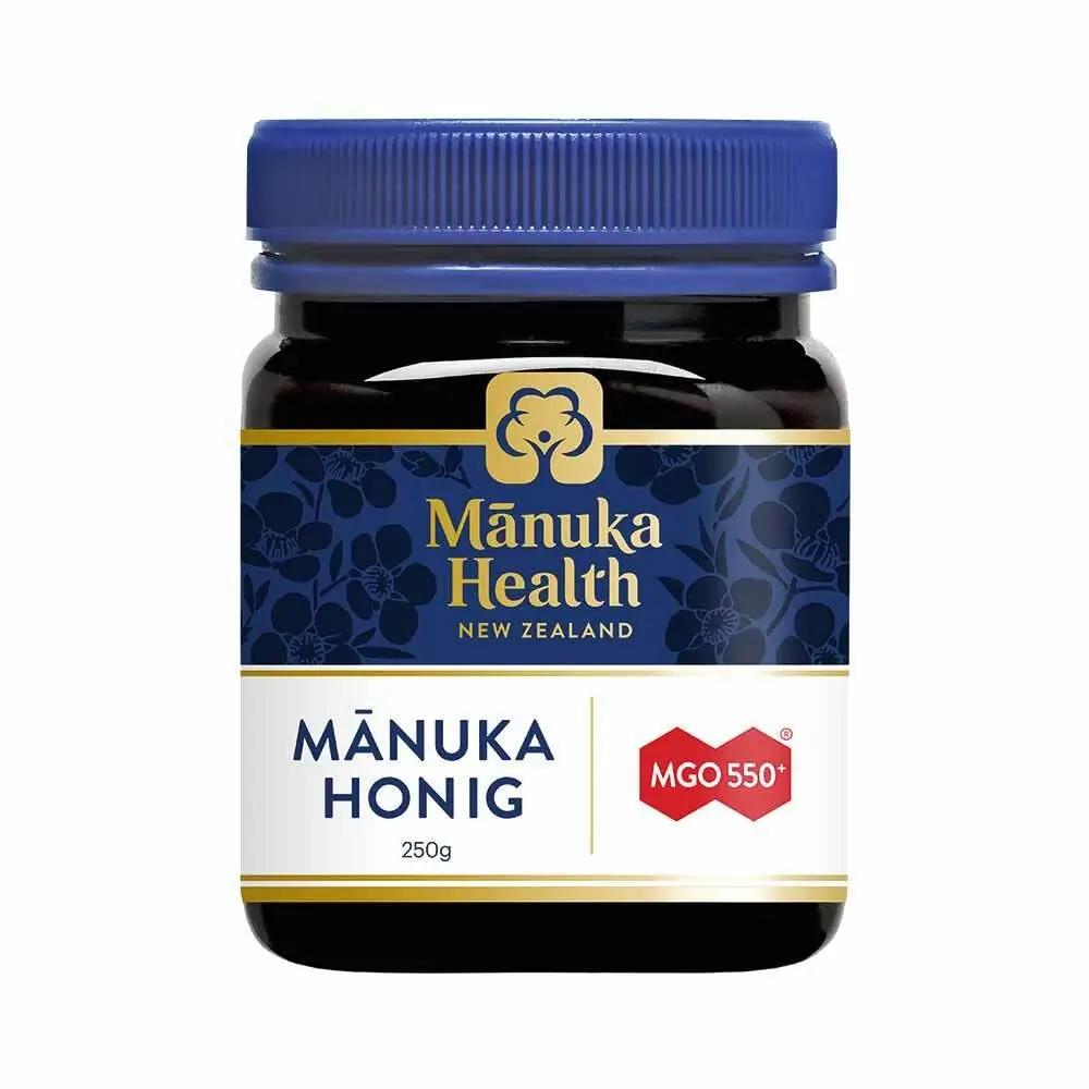 Manuka Health tõhus MGO 550+ mesi — looduslik ajuhea 250 g – pakend ja tarvikud
