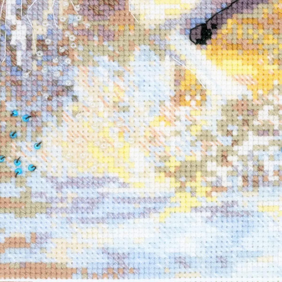 Riolis pehme puuvillane ristpistesett — päikeseloojang 60×40 – kasutusnäide