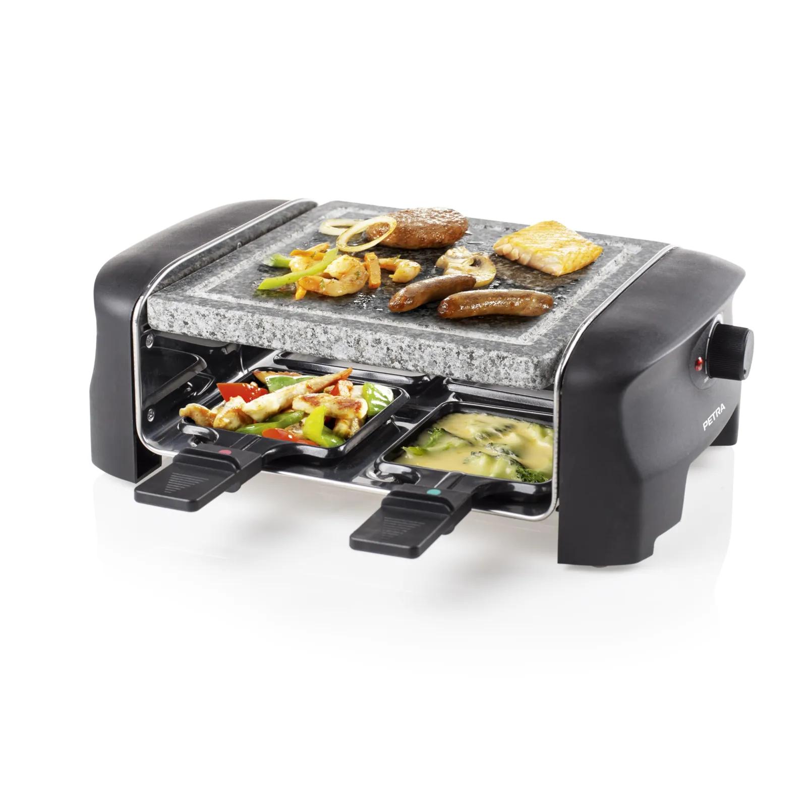 Princess raclette-grill kiviplaadiga, peal vorstid ja köögiviljad